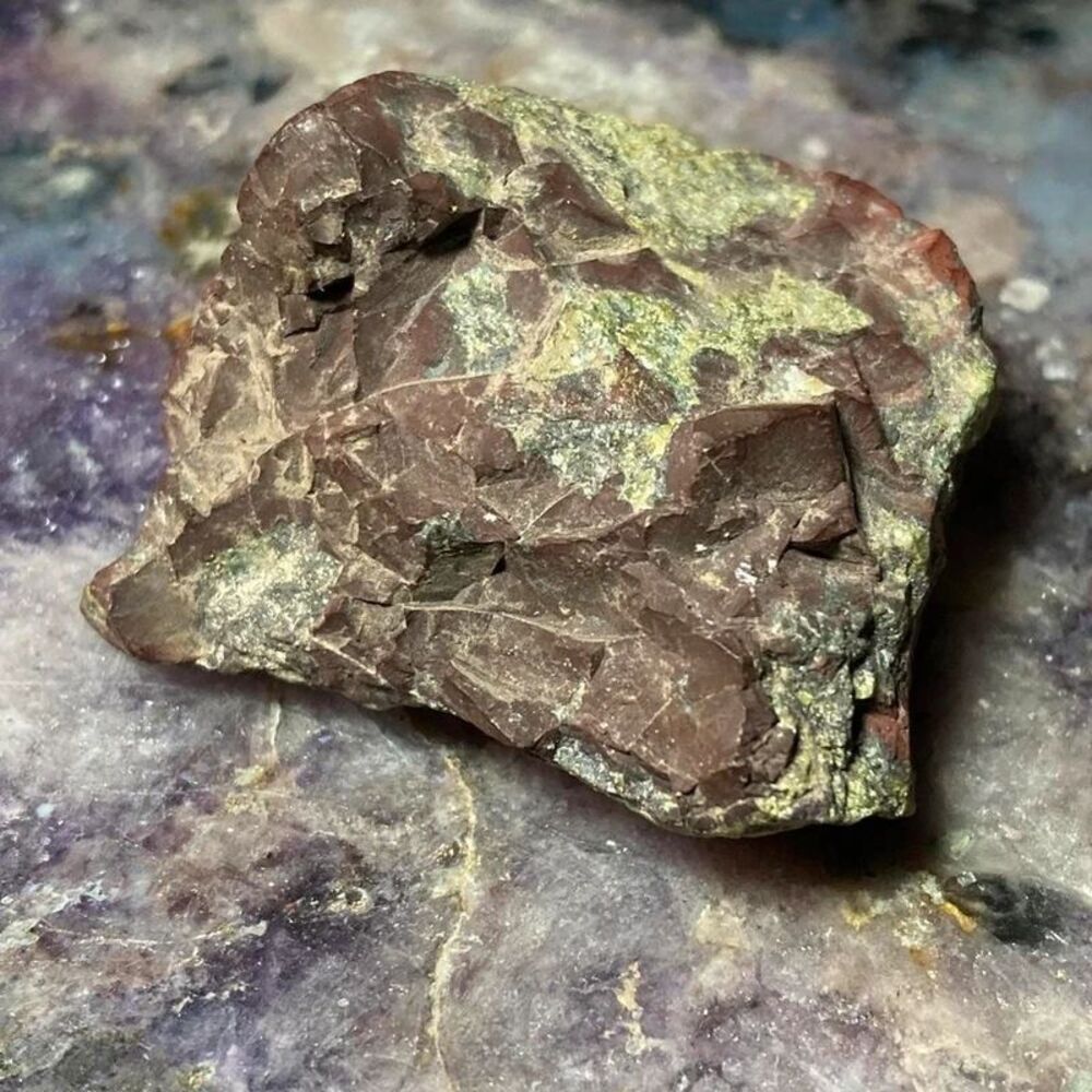 Raw large dragons blood jasper specimen